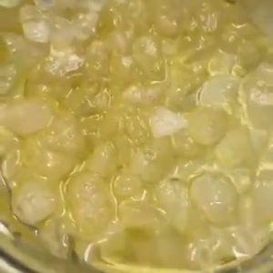THCA Diamonds in HTE Sauce for bulk wholesale, close-up