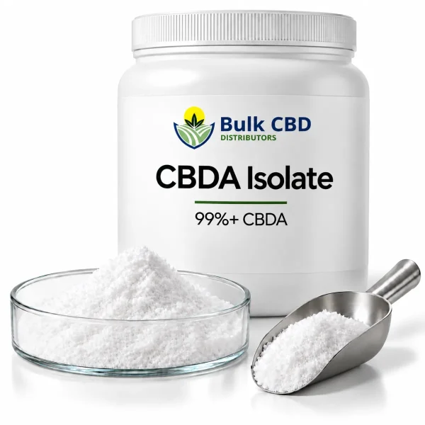 CBDA isolate powder in a white jar with a glass dish and steel scoop, bulk and wholesale from Bulk CBD Distributors