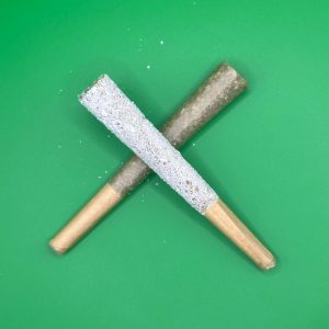 Iced THCA pre-roll and regular THCA pre-roll crossed in an X