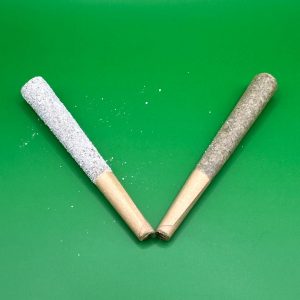 Iced THCA pre-roll beside a regular THCA pre-roll in a V shape