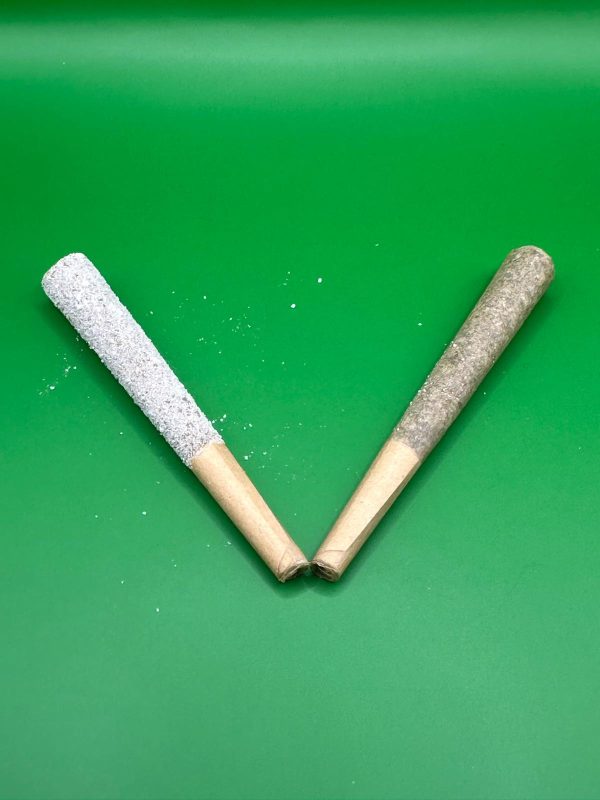 Iced THCA pre-roll beside a regular THCA pre-roll in a V shape