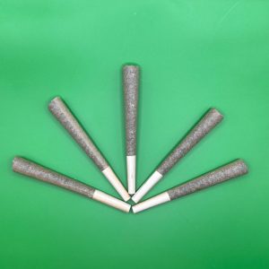 Five THCA hemp pre-rolls fanned out with white filter tips