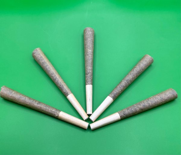 Five THCA hemp pre-rolls arranged in a fan with filter tips
